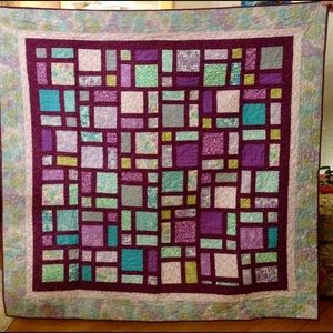 Homemade lap quilt.